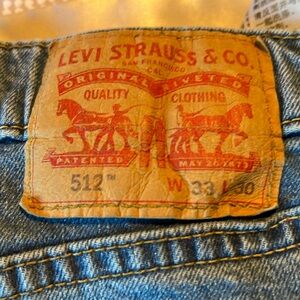 Men’s Levi jeans number 512 cut midweight denim 33 waist and 30 length sl fade